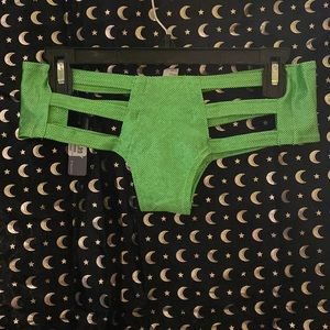 Rave cut out green shiny booty shorts